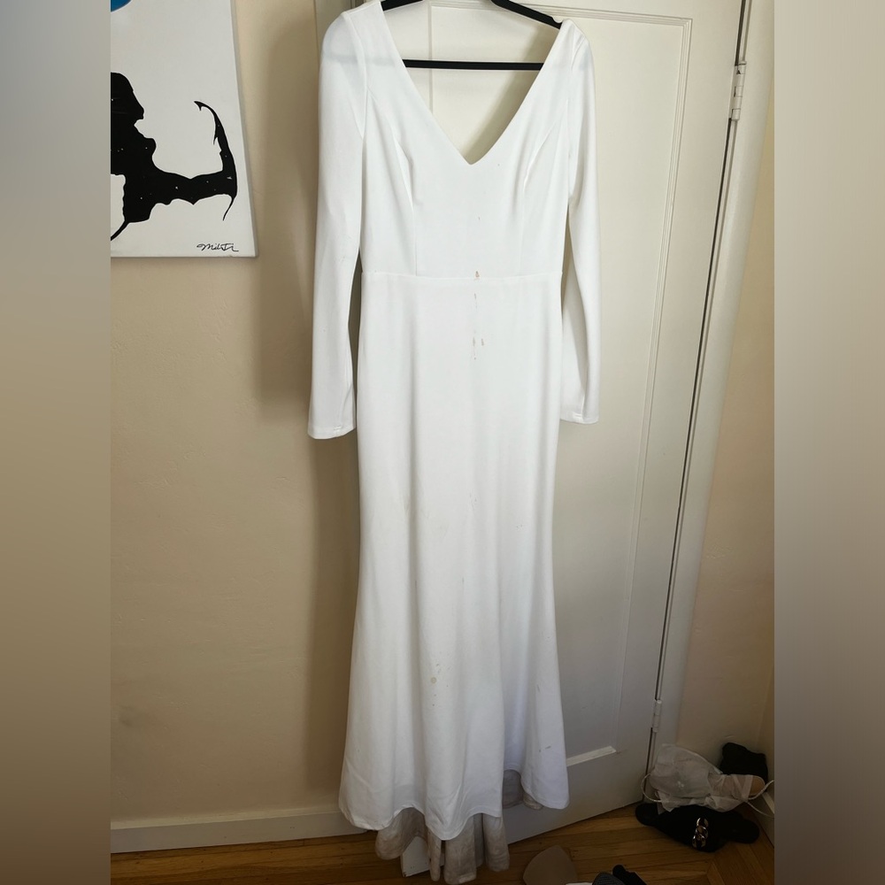 Button back white wedding dress subtle train